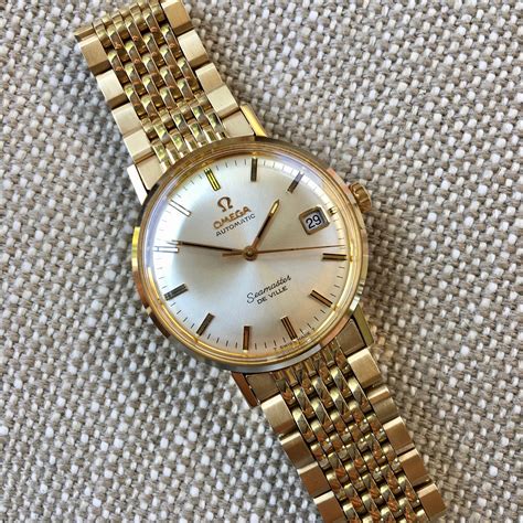 omega seamaster gold vintage.